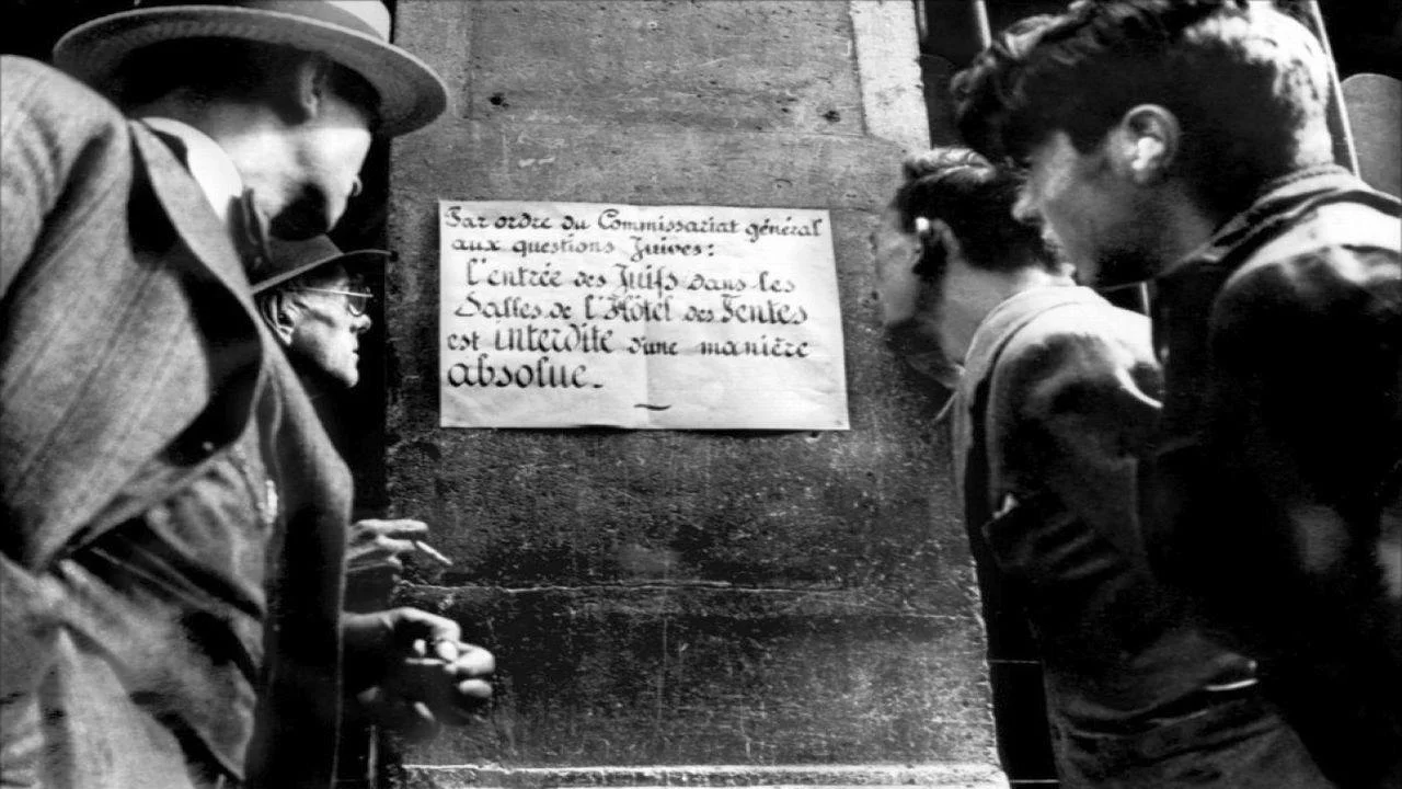 Paris, 1938, another landmark on the history of the Vichy government is Marcel Ophuls' 1969 two part documentary, Le Chagrin et La Pitie ( The Sorrow and The Pity)