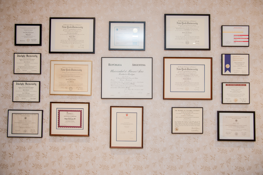 Our wall of diplomas