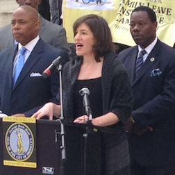 Seleni executive director Rebecca Benghiat speaking at the Family Friendly Brooklyn rally.