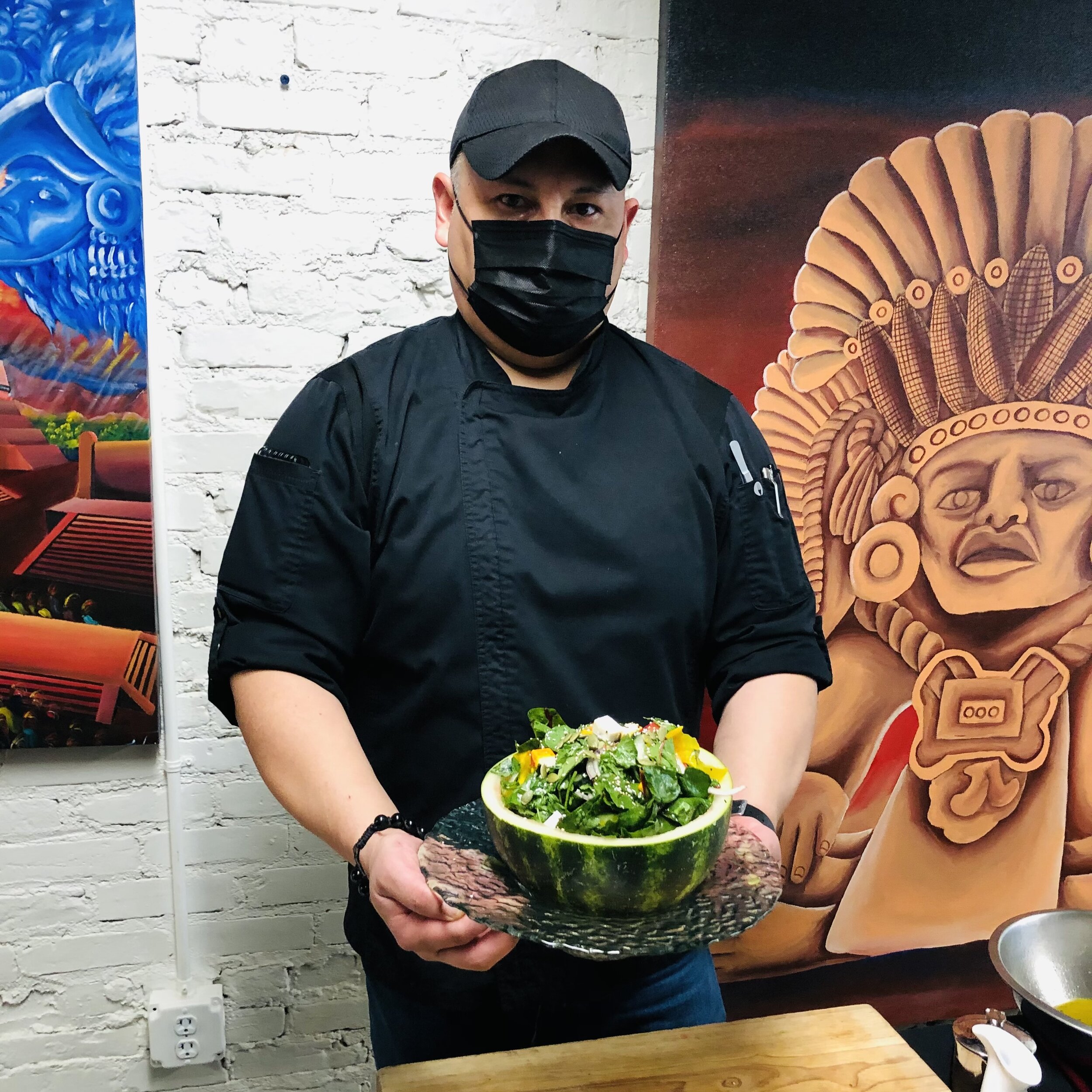 Chef holding Watermelon Salad.jpeg