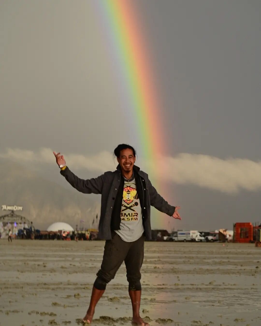 Meanwhile in Black Rock City...
Rain ☔, mud 😛, and double rainbow across the sky! 🌈🌈 

No cars &amp; bicycles.
Magnificent sunset. 
Few people out &amp; about. 
Reflections across the Playa.
No matter how grand our plans &amp; intentions, 
In the 