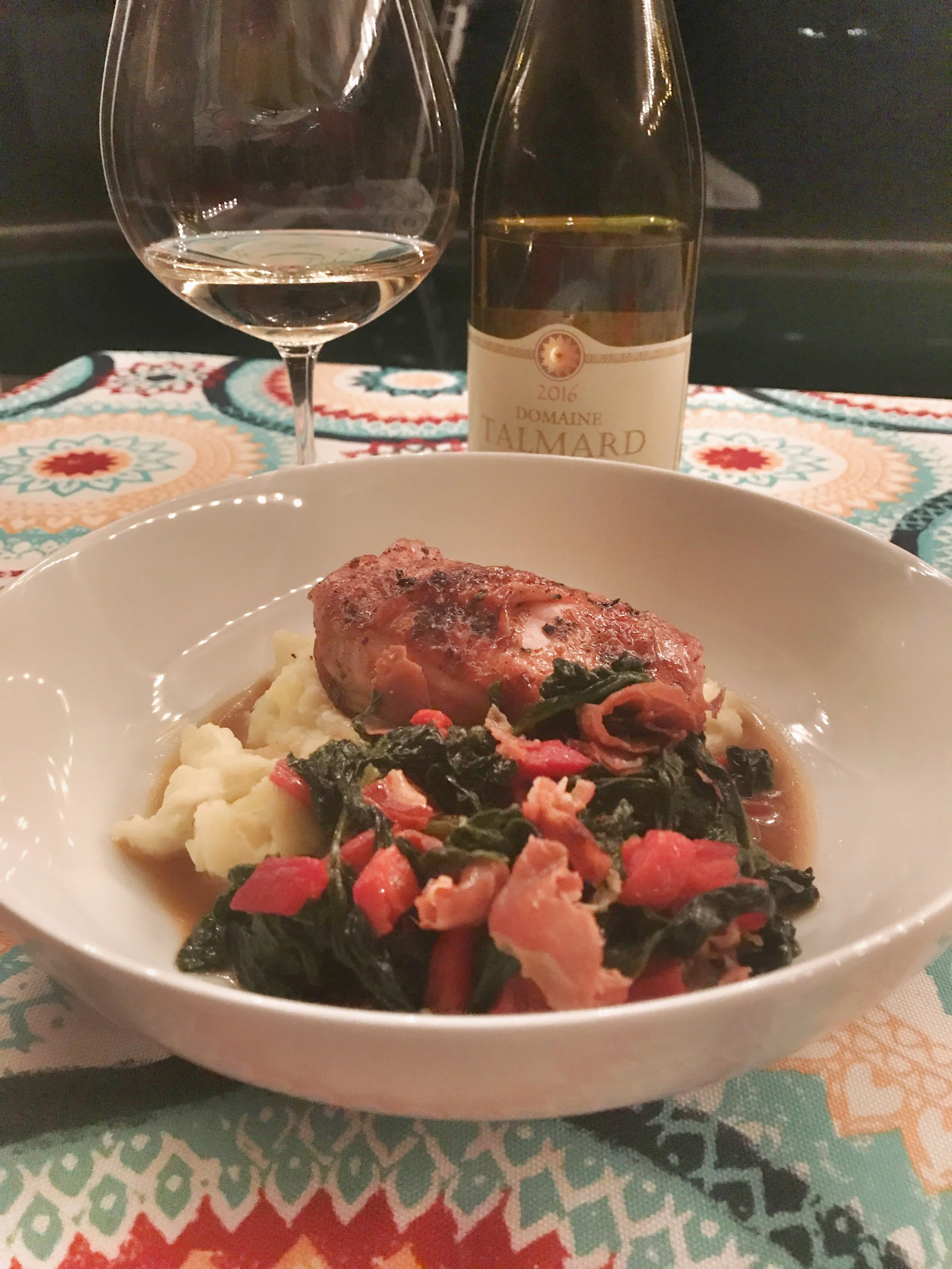 What I had in the fridge tonight : leftover grilled chicken thighs, leftover mashed potatoes, spinach, a jar of roasted red peppers, some goat cheese and some prosciutto. Thighs just went back into oven to warm. Mashed potatoes on the stovetop on low heat with some chicken stock and a big crumble of goat cheese at the end. Julienned and then crisped up the prosciutto in olive oil then added the diced peppers and fresh spinach. Wilted those guys down and then threw in a glug of chicken stock, reduced all of it and finished up with a chunk of good butter and some chopped parsley. Put it all in a bowl and pour a glass of the 16 Talmard Mâcon and you've got something pretty damn satisfying. Cook at home. It's worth it. 