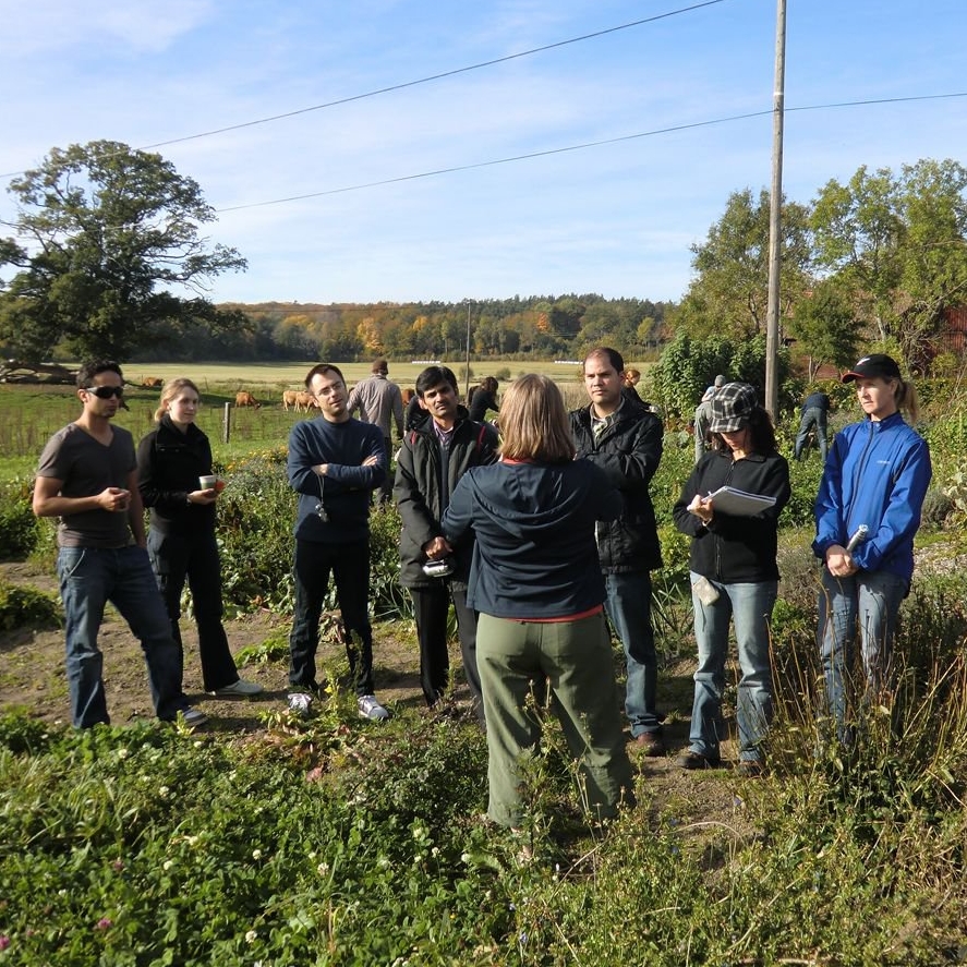 Tracy teaching permaculture_rawmaterialsecon.jpg