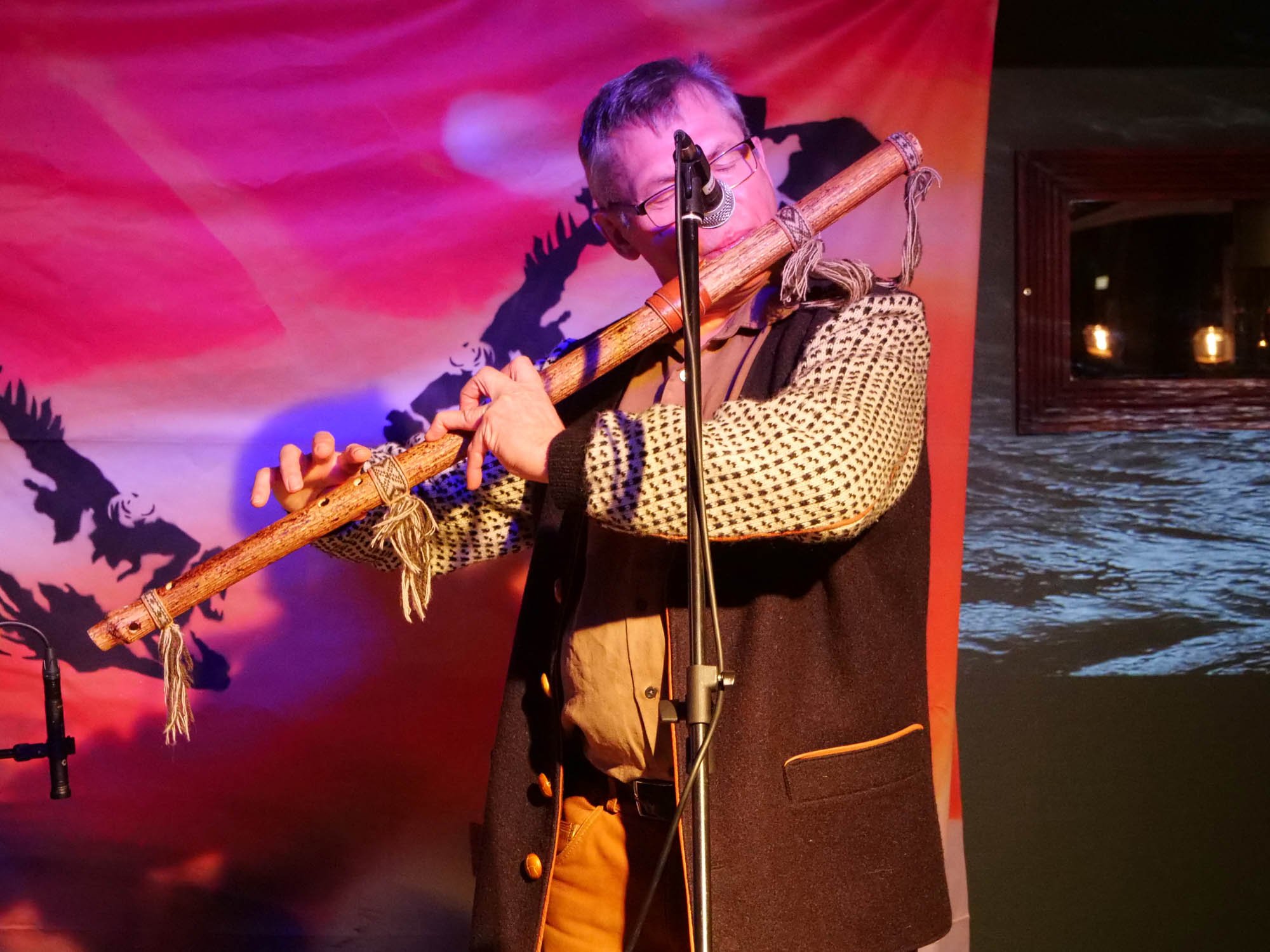  Øistein Hanssen playing on a home made instrument to honour all those who have died at sea.  