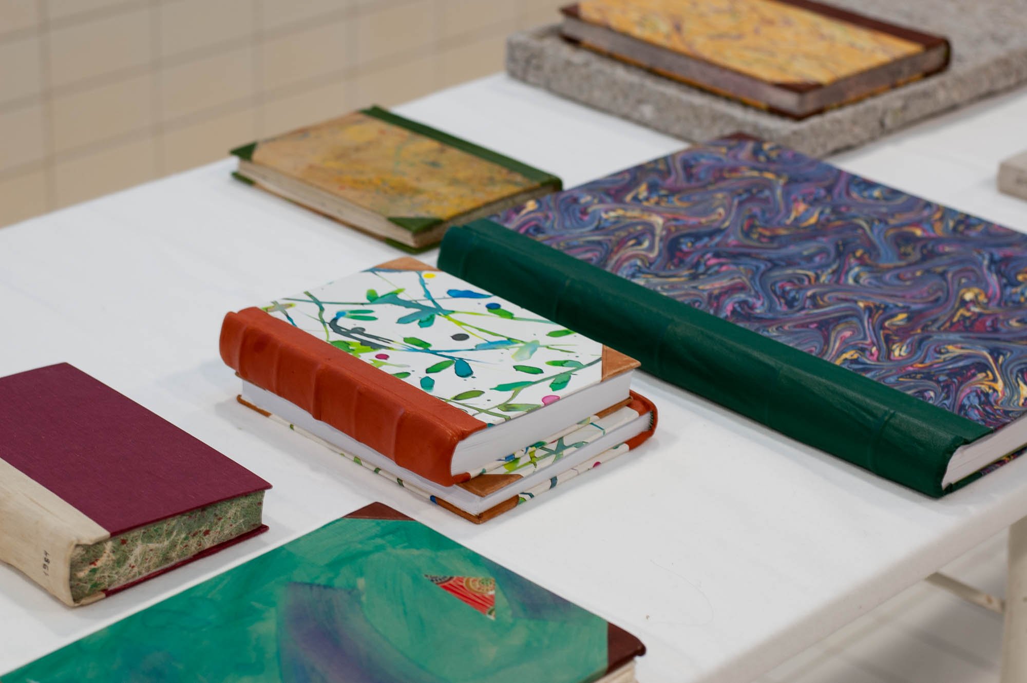  Some of the artist’s book binding projects were exhibited at the Arctic Art Book Fair 2020 in Romsa / Tromsø. Photo: Hilde Sørstrøm. 