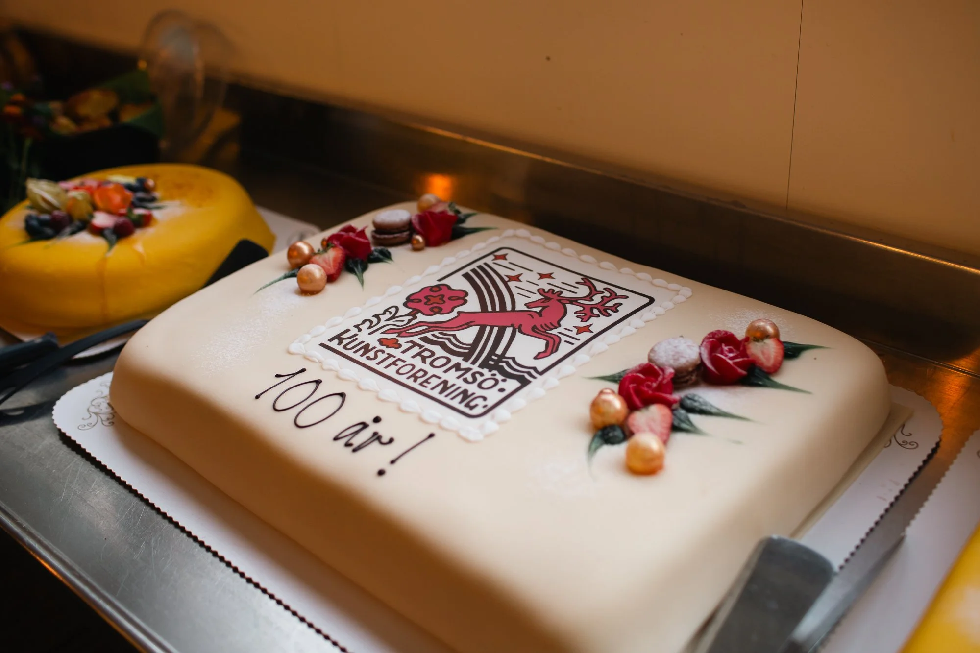  Anniversary cake at the opening of the exhibition  History is the dream of what can be  at Tromsø Kunstforening. Photo: Daniela Toma / Tromsø Kunstforening 