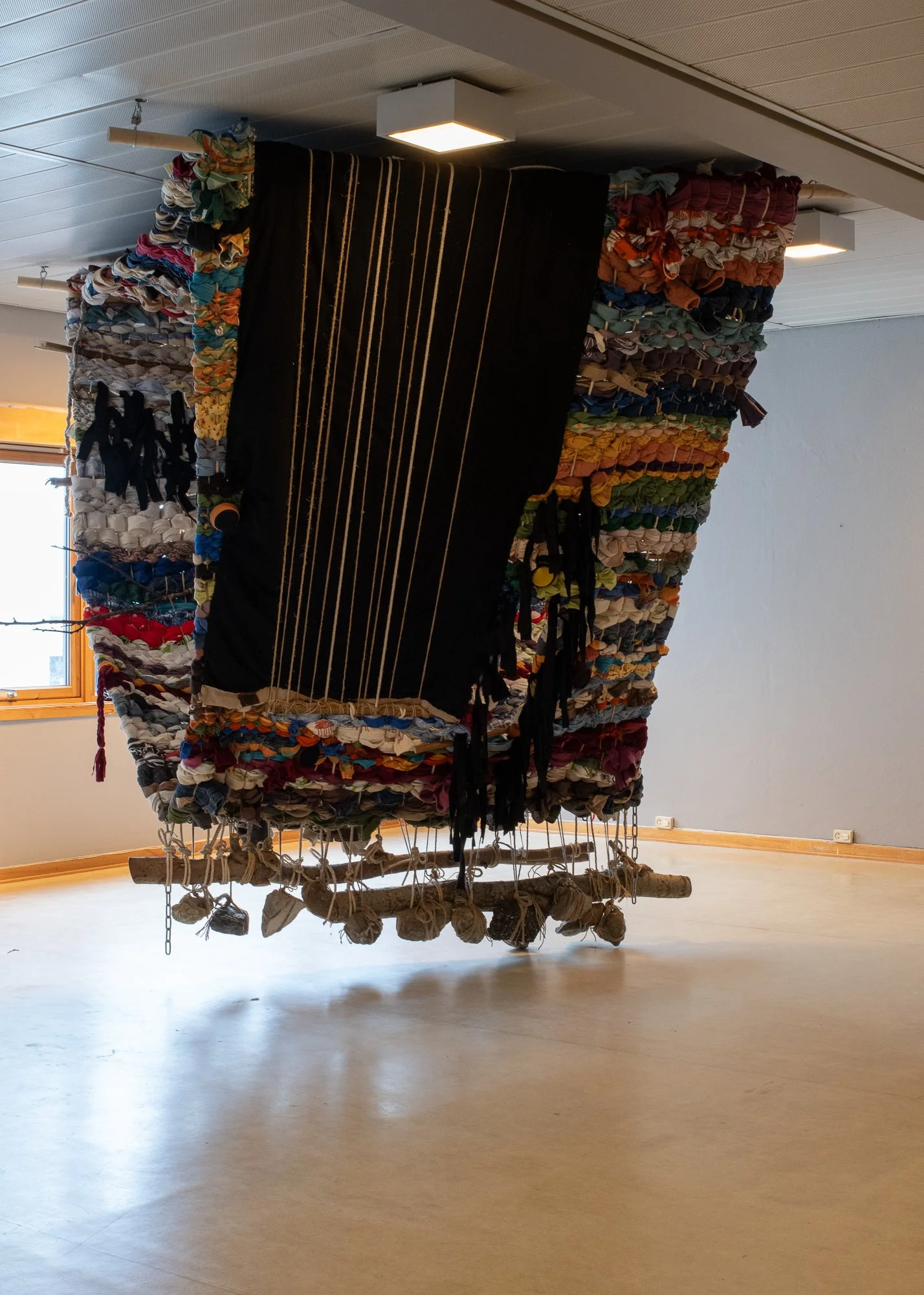   Siirtymäraanu / Moving Blanket  by Liv Bangsund, Inger Emilie Solheim and Maija Liisa Björklund. Photo: Mihály Stefanovicz / Tromsø Kunstforening  