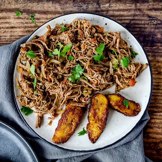 Happy June, foodies!! 💛 It&rsquo;s my birthday month and I&rsquo;m kicking it off with this bomb slow cooked Ropa Vieja recipe! Ropa Vieja, meaning &ldquo;old clothes&rdquo; in Spanish is the national dish of Cuba and personally, one of my favorite 