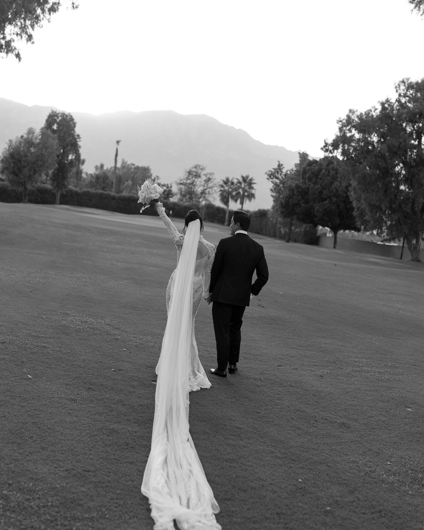 warm summer nights in palm springs featuring a stunning @galialahav gown. 🌞

vendor team:
planning | @blush.events 
photography | @sajephotog 
content creation | @cupidcontentco 
venue | @desertislandcountryclub 
florals | @cityflowerla 
bar | @noma