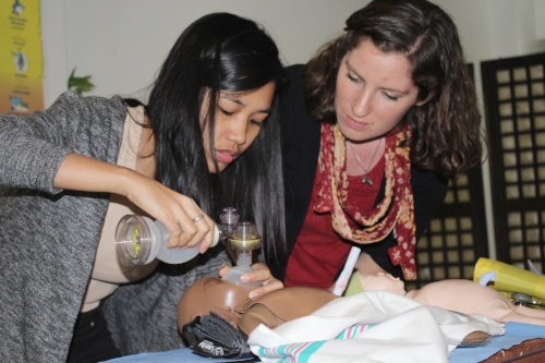 Diploma Scholar Hannah teaching Helping Babies Survive classes for local midwives in the Philippines. This interactive simulator called NeoNatalie can be donated to allow local midwives to continue training in a "Low Dose, High Frequency" methodology long after the trainer has gone home, thereby improving maternal/child health and welfare for untold thousands in future years.
