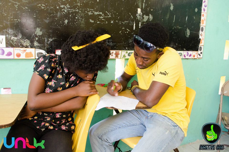 Neville Charlton helps a child in state care at the National Children's Home