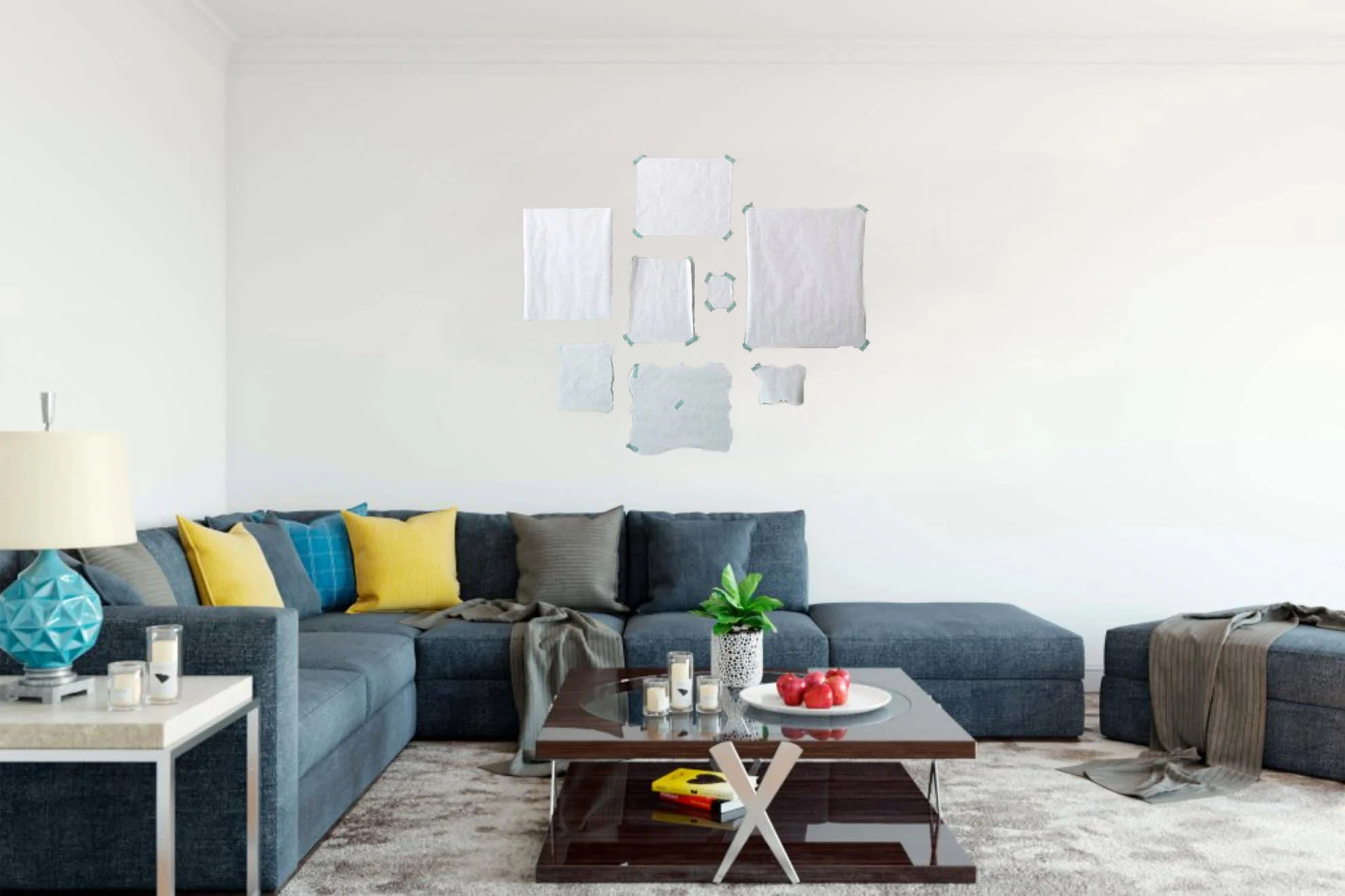 Using pieces of paper to make a template can be really handy when planning out a wall gallery