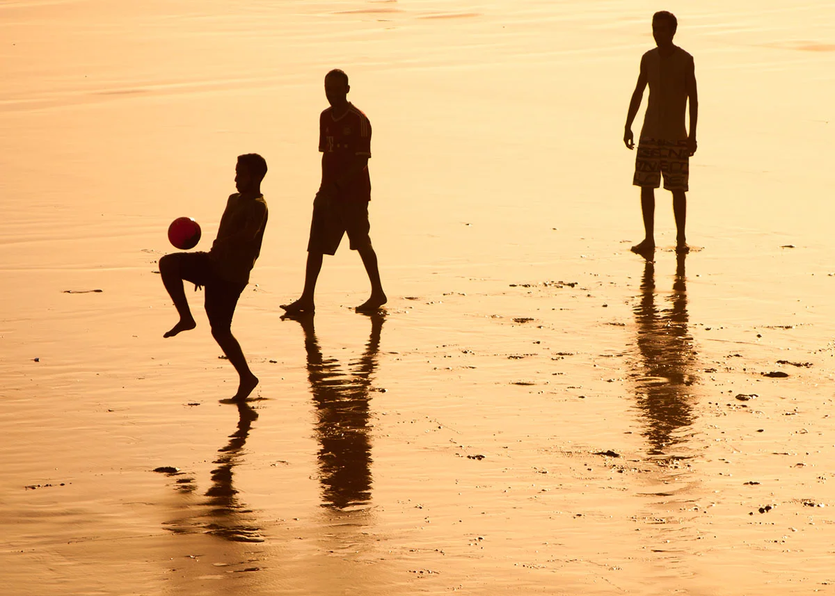 You might find you can get some stunning photos by placing the sun directly behind your model and under exposing them. This works especially well around sunrise or sunset, but in the heat of the day you can create interesting silhouettes by getting down low in your subjects shadow.