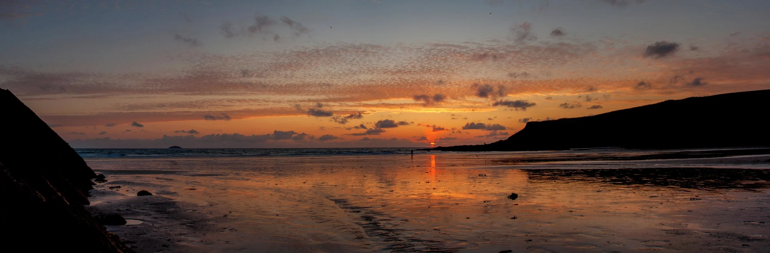 Underexposing really brings out the colour in the sky, I really love the reflection of the colour in the wet sand of the beach.