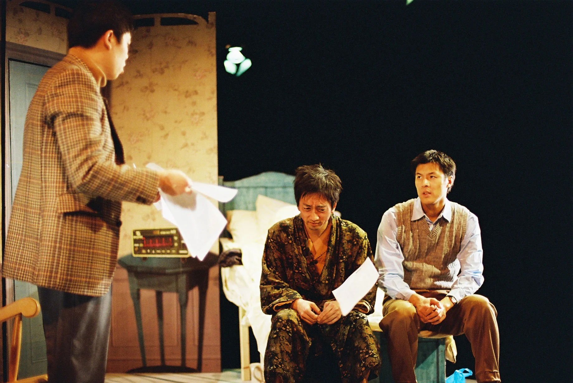 Scene from Yellow Gentlemen, Oval House Theatre (2006). Chan-Pensley (left), Tse (middle), Goh (right).
