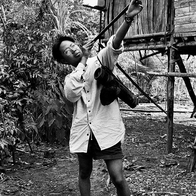 Posing with blowpipe. This is from my travels to a remote part of the Indonesian #jungle to visit the hunter-gather tribe the Wana.  This was shot on black and white film in the pre-digital age.  Lugging cameras in the rainforest not fun. 
https://ww