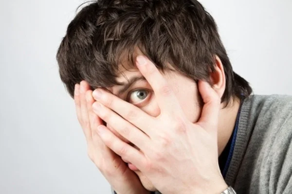 scared-man-covering-eyes-ftr.jpg