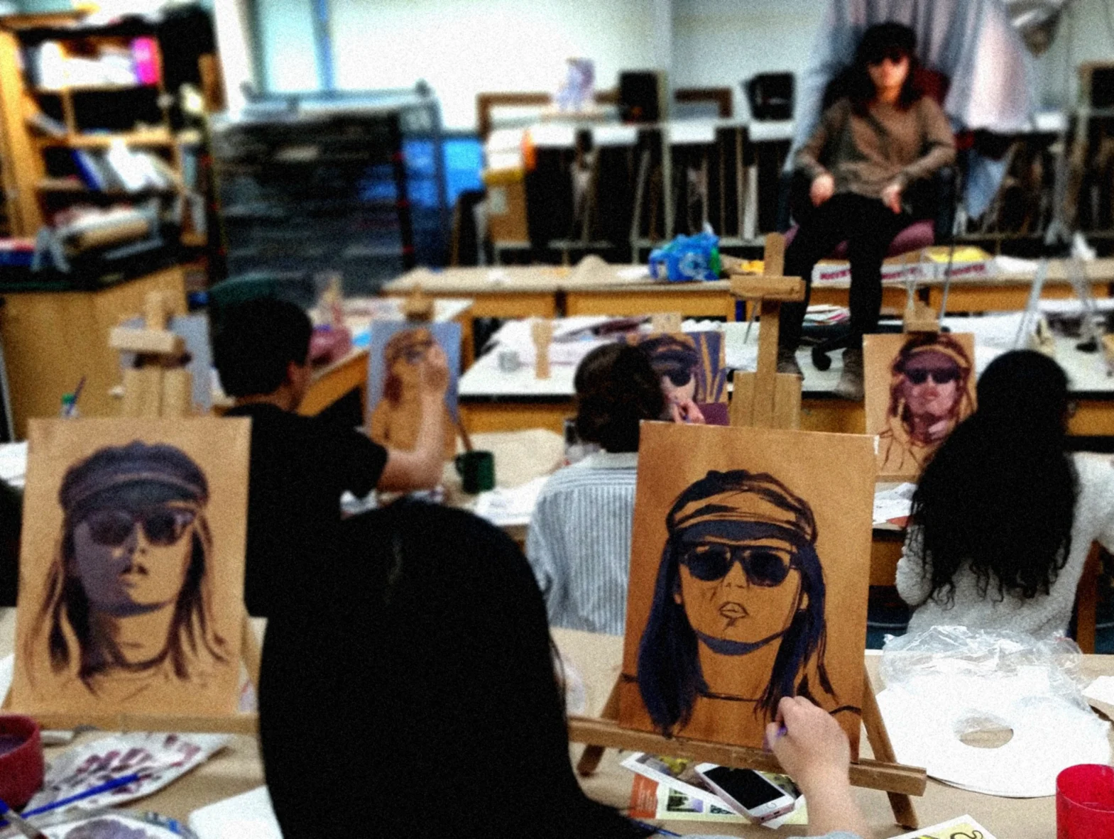 Students participating in a four hour studio workshop in the early stages of a costumed portrait. 