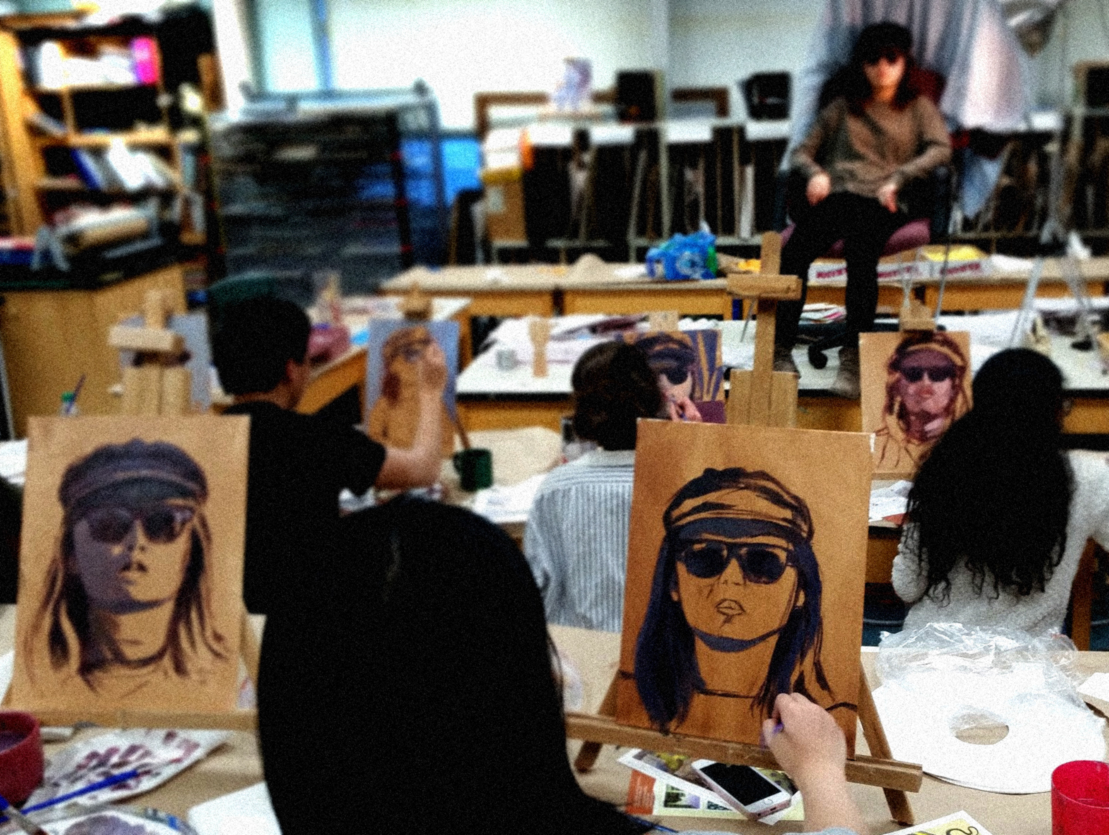 Students participating in a four hour studio workshop in the early stages of a costumed portrait. 