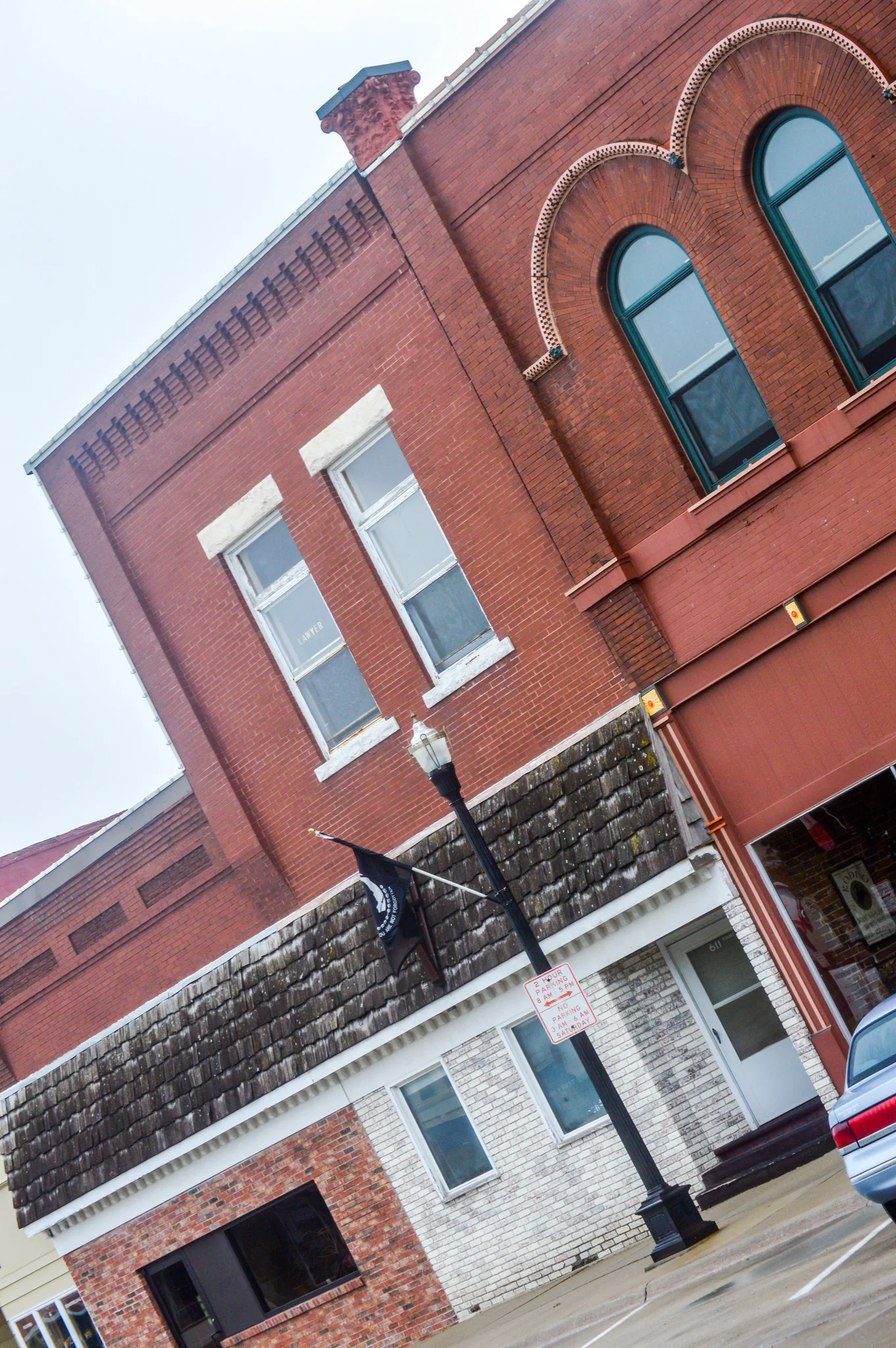 Another image where she tilted the camera on purpose. Her eye for making a plain building into something interesting amazes me.