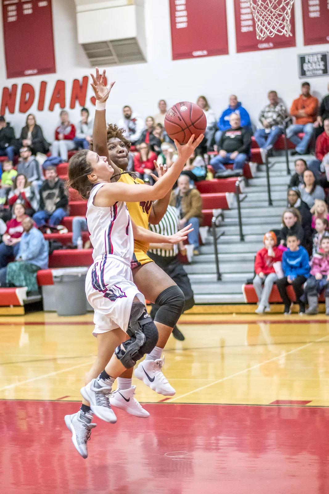 Ally Young was one of the major inspirations of the night. After just just a couple minutes into the first game, she tore her ACL. This was her first time she was playing at Fort Osage after completing her rehab. You should have heard the roar from the crowd when she scored this lay-up!