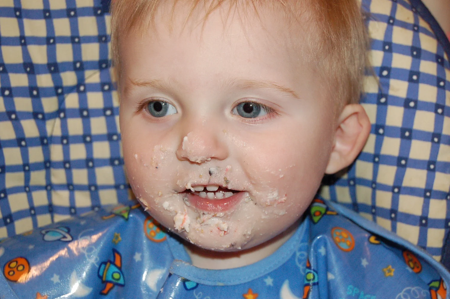 Tristan’s first birthday. He’s always been a messy eater!