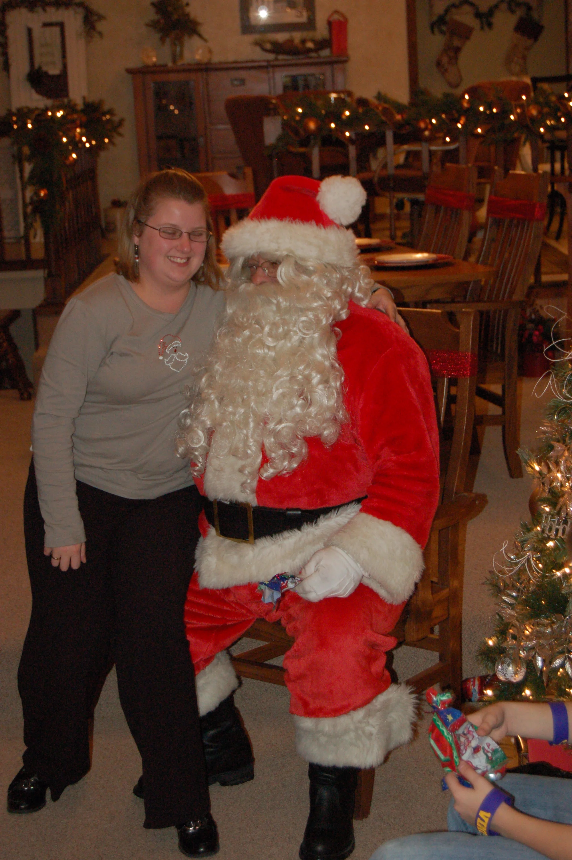 I love that Sandy will put up with the silly things my family does. Including making everyone (even adults) sit on Santa's lap at Christmas time.