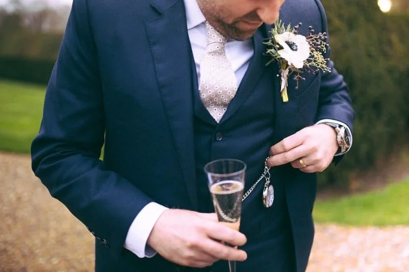 Splash out (still less money than your bride will probably spend!) on a bespoke suit, handmade in the UK from Italian an British fabrics. Like this one and below from King and Allen .