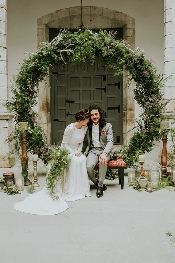 Forget the Christmas tree and embrace the wedding wreath instead. Going big for maximum impact like this from 100 Layer cake image by M2 visual.