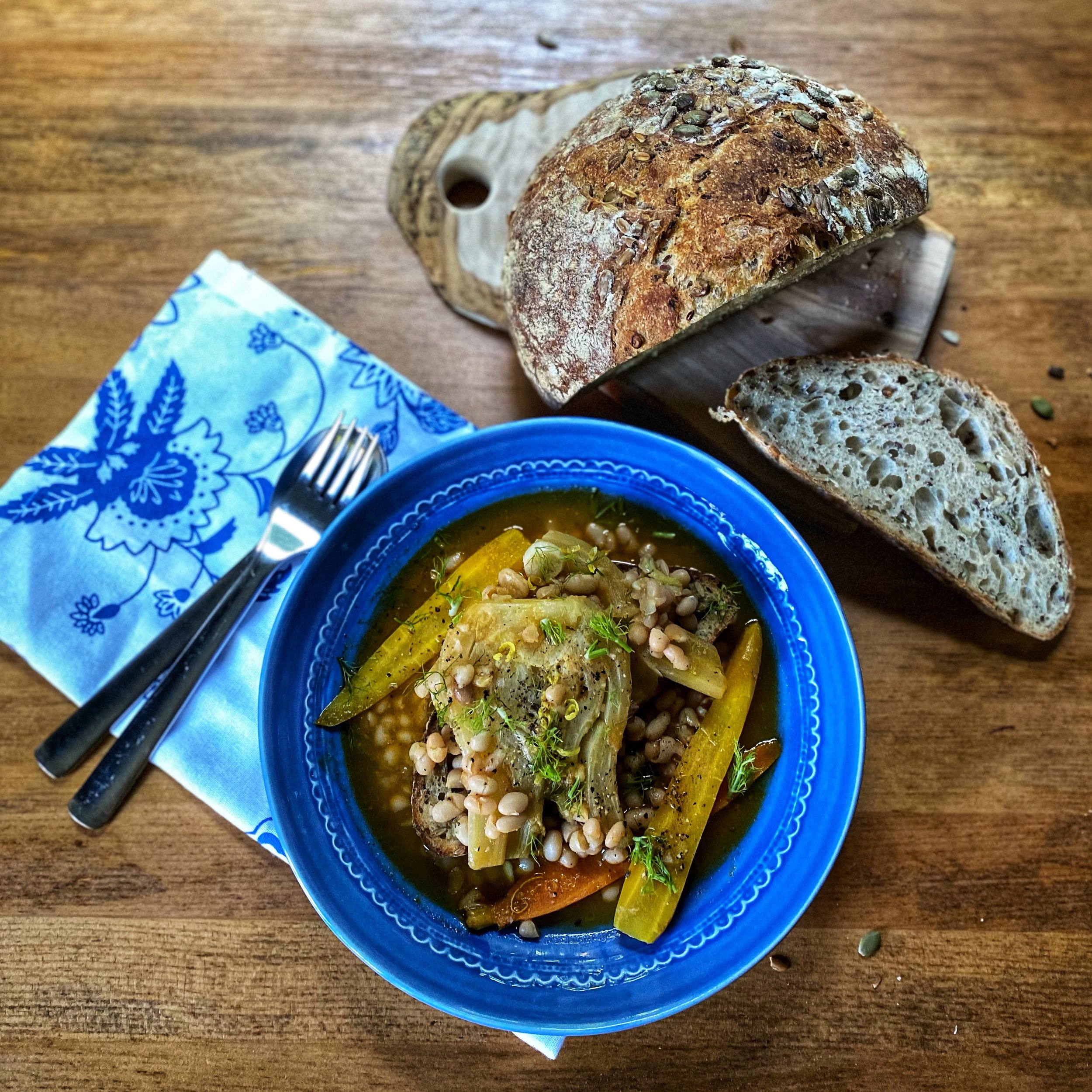 braised fennel and white beans overhead with bread.jpeg