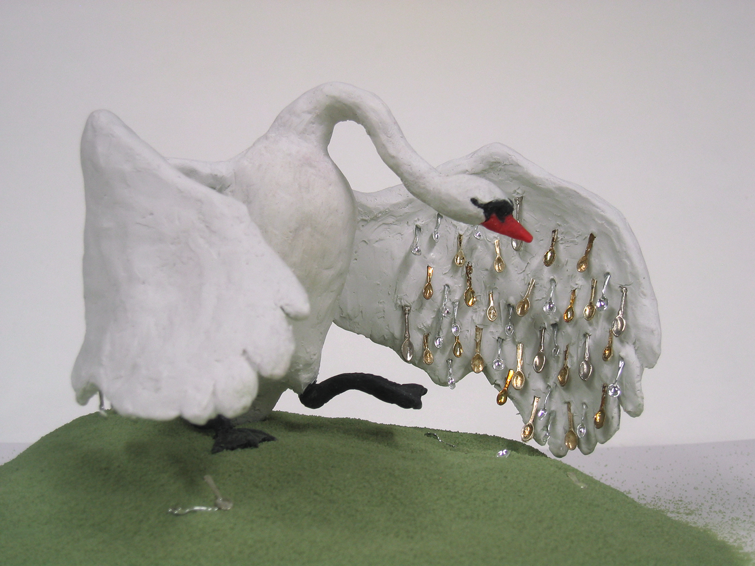   Spoon-feathered swan, 2008, Sculpey clay, dollhouse spoons, mixed media, 6 h x 9.5 w x 8.5 d in . 