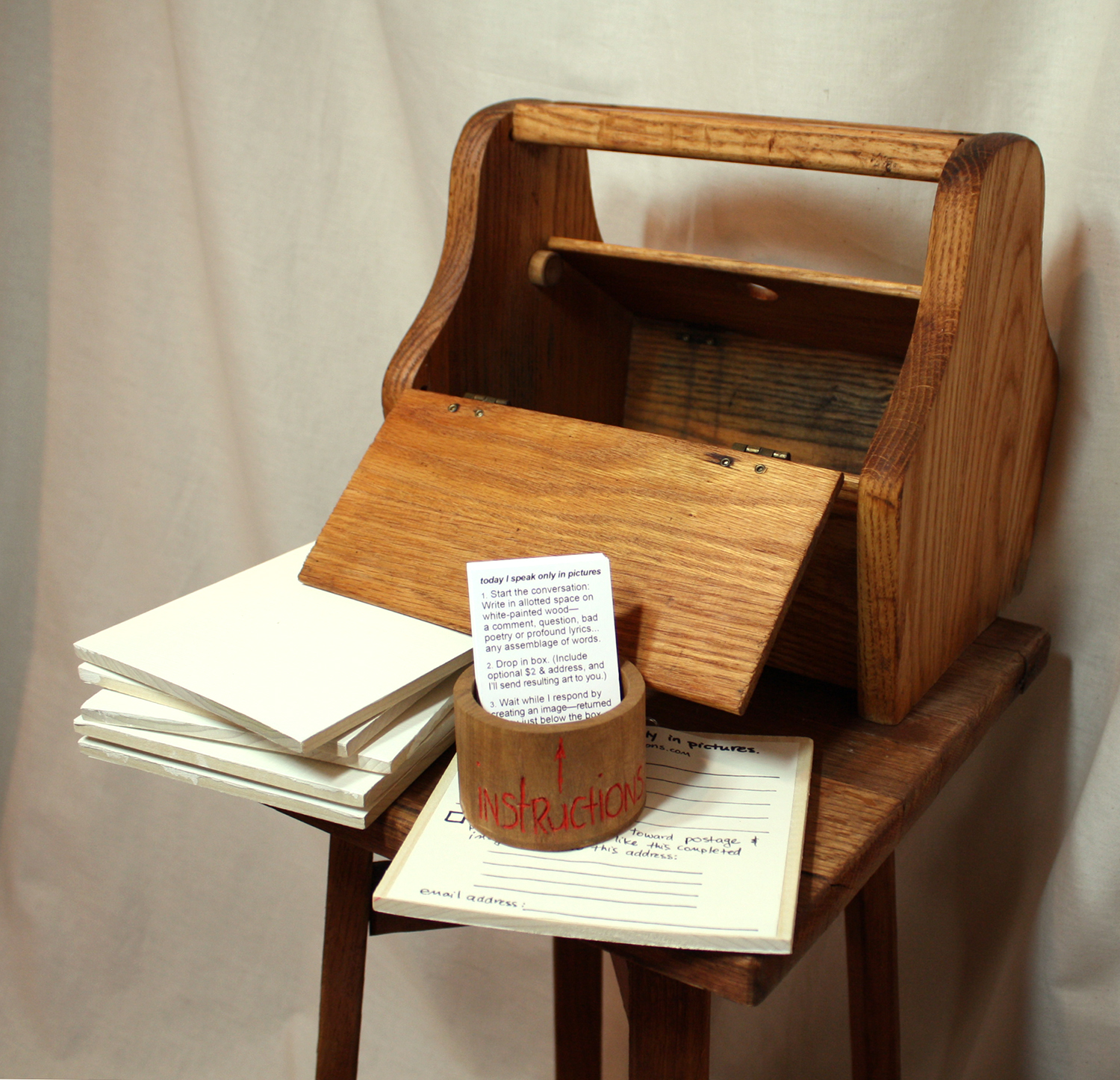 Today speak only in pictures , 2013, submission box, instruction cards and painting tiles