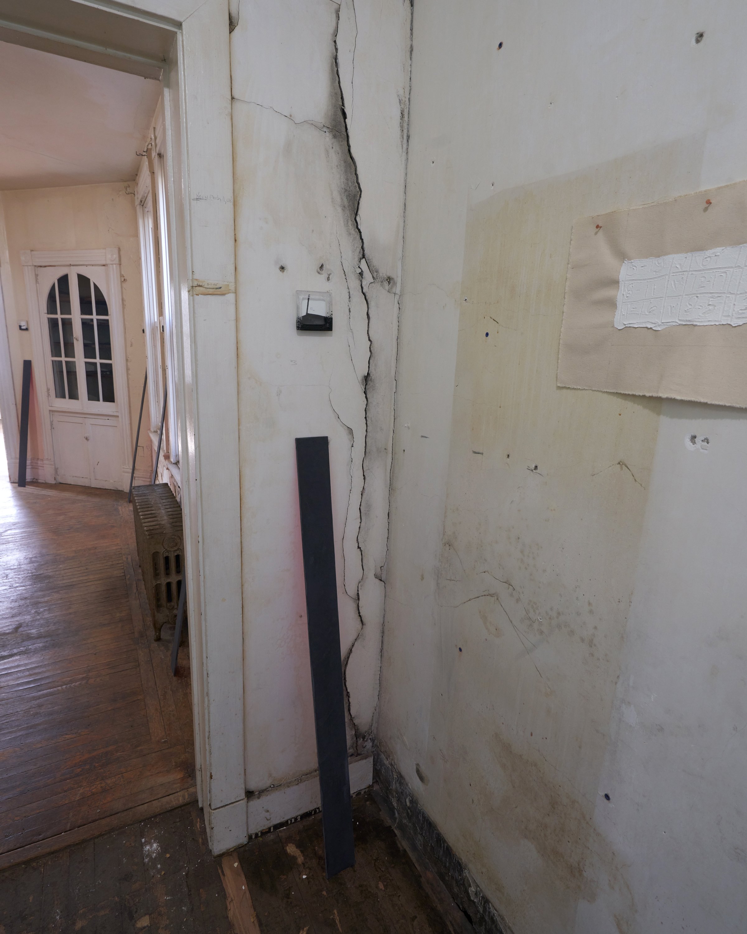   View from the former kitchen into the former dining room. ”blankspace” exhibition space  