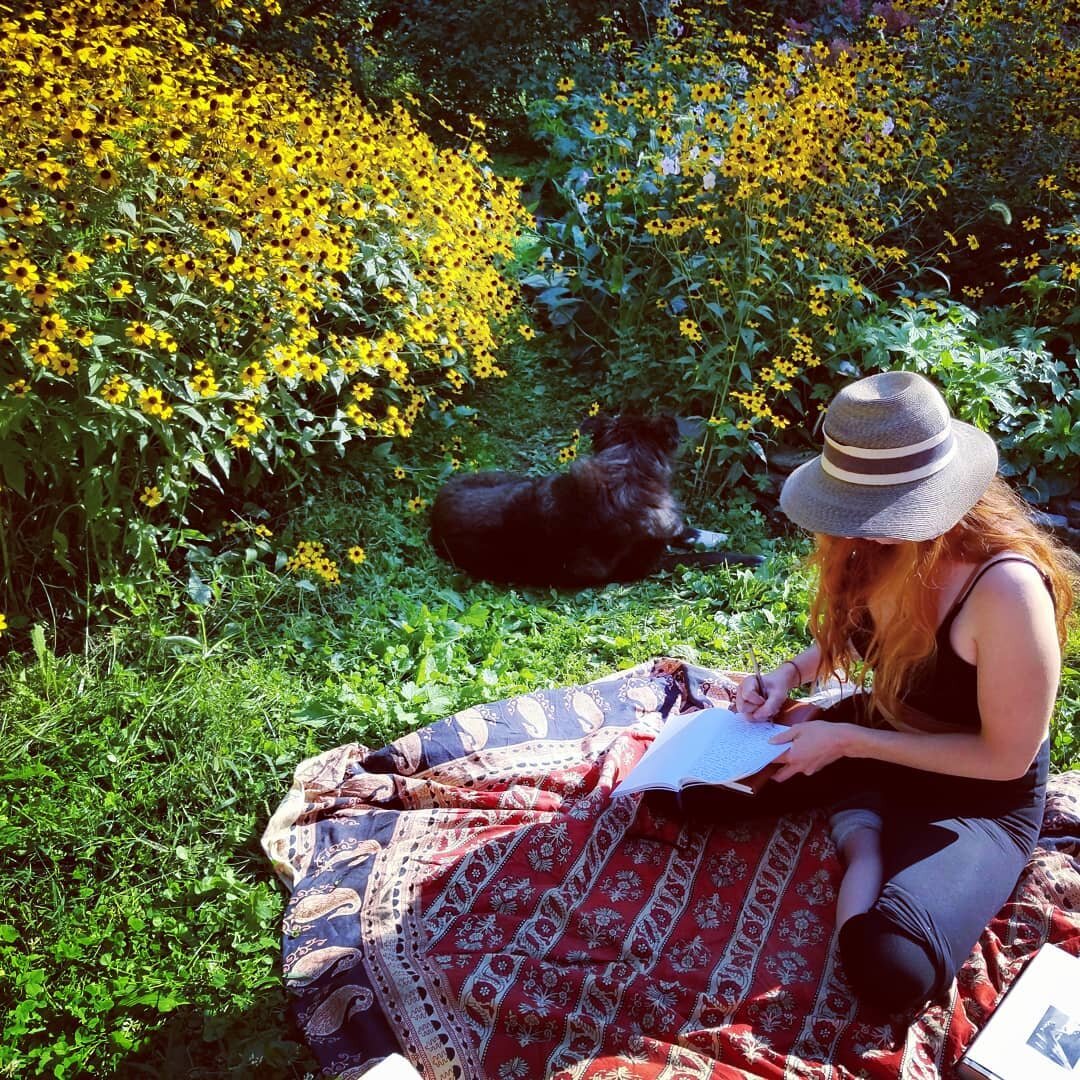 Writing in a sea of flowers, loving the fall blooms at Gaia. 💗💗