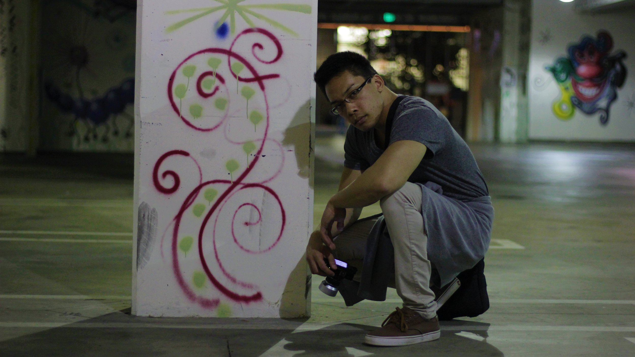 Art Night - Kevin Posing by Graffiti.JPG