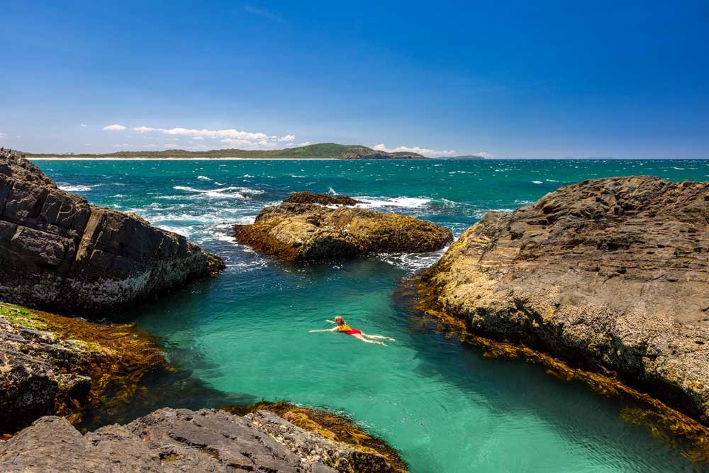 Swimming in Crescent Head's secret azure rock channel