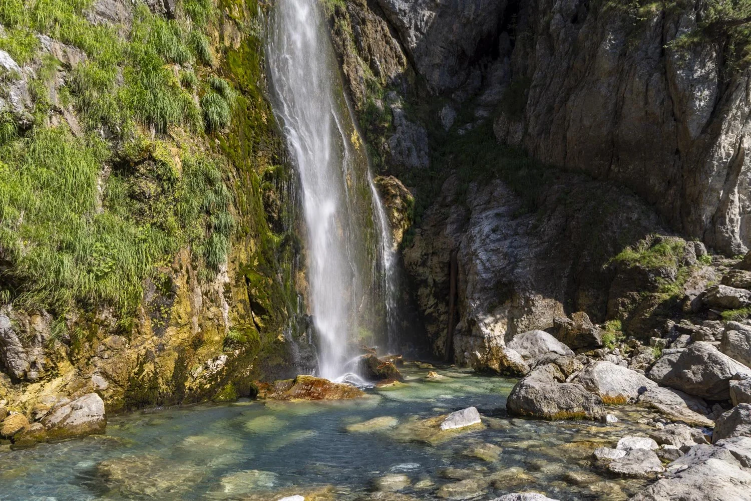 Grunas Waterfall: a spectacular waterfall you can swim under in Theth