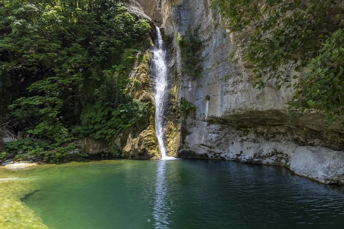 Nivicë Canyon: a spectacular waterfall and swimming hole near Gjirokaster 