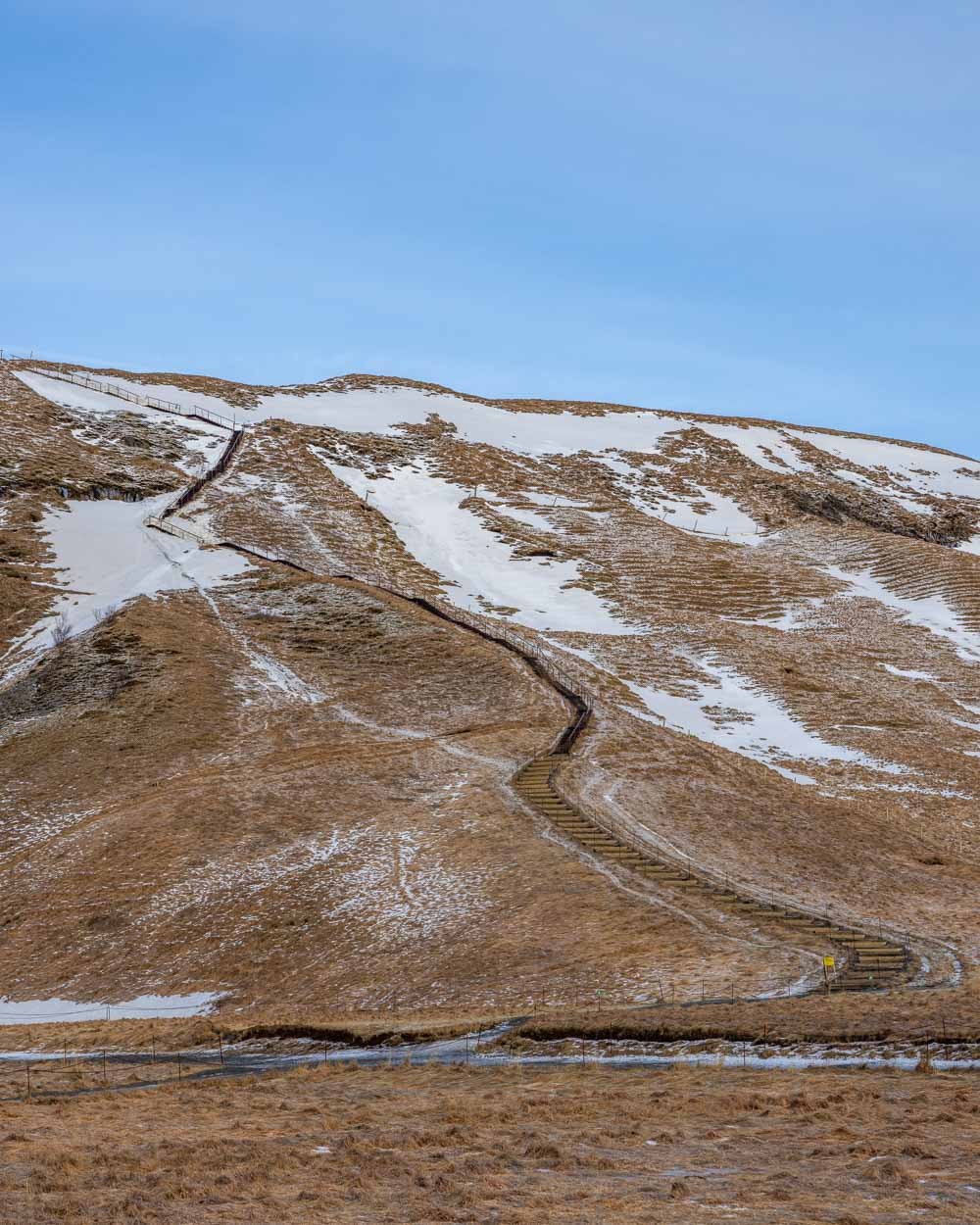The path to the upper viewpoint of Skogafoss in winter