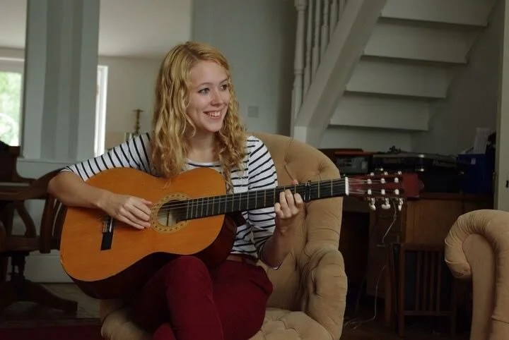 lucy turton with guitar.jpeg