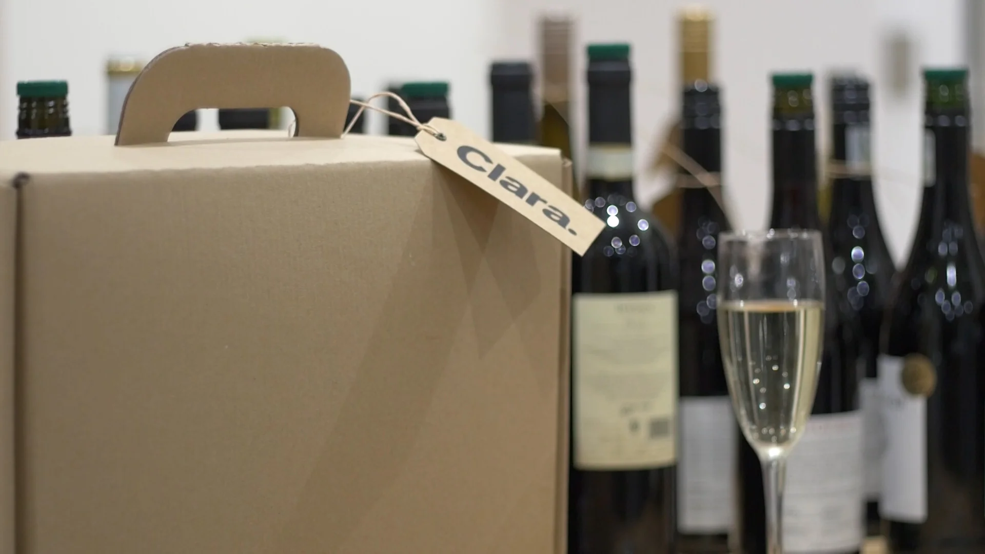 A cardboard briefcase of Clara wine.