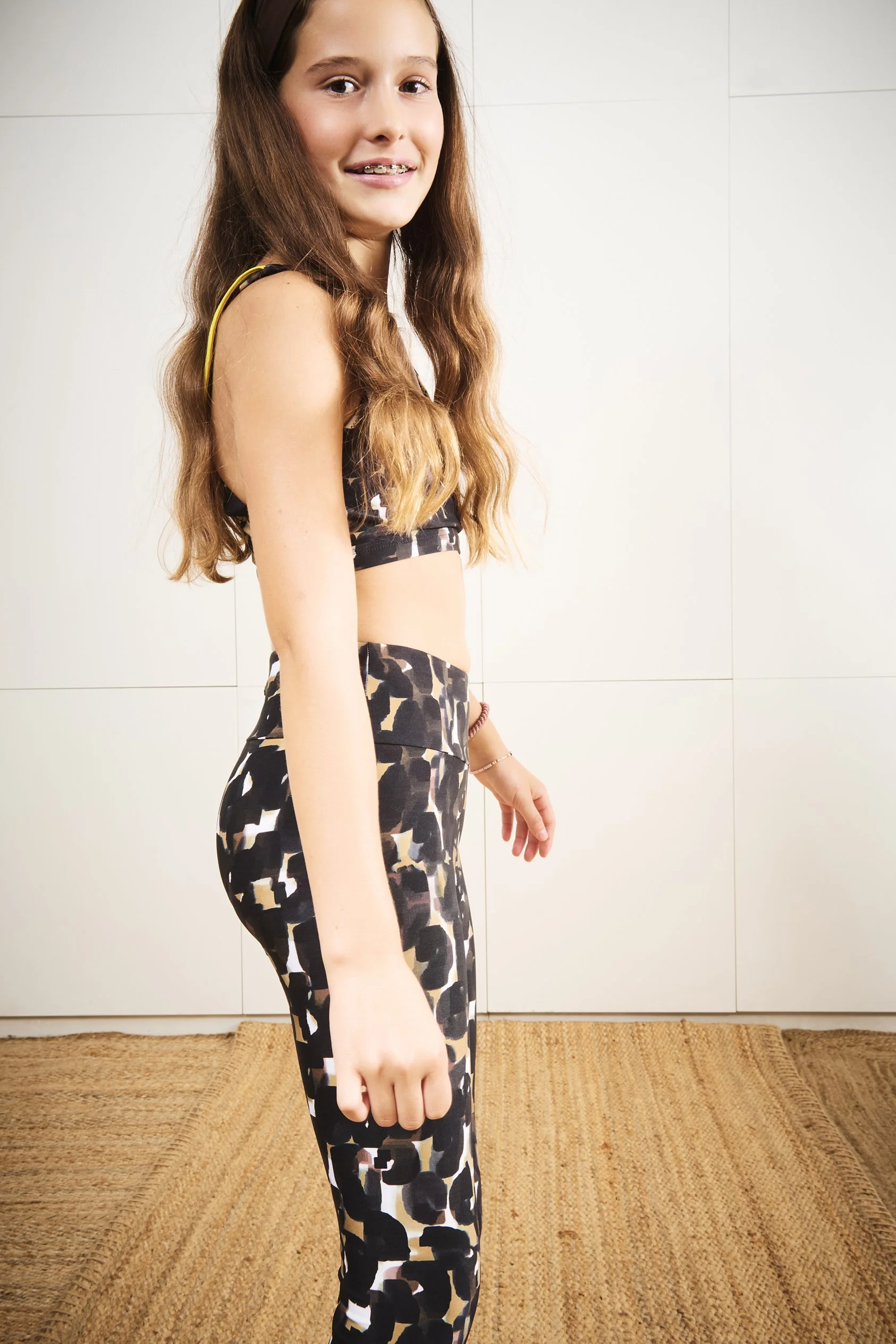 ALAIA leggins + EQUINOX top in luwak maracaibo print side teen - STUDIO.jpg