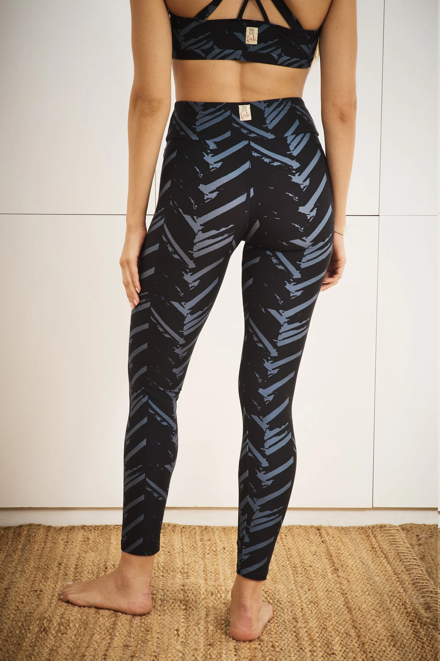 ALAIA leggins + EQUINOX top in black love print back detail - STUDIO.jpg