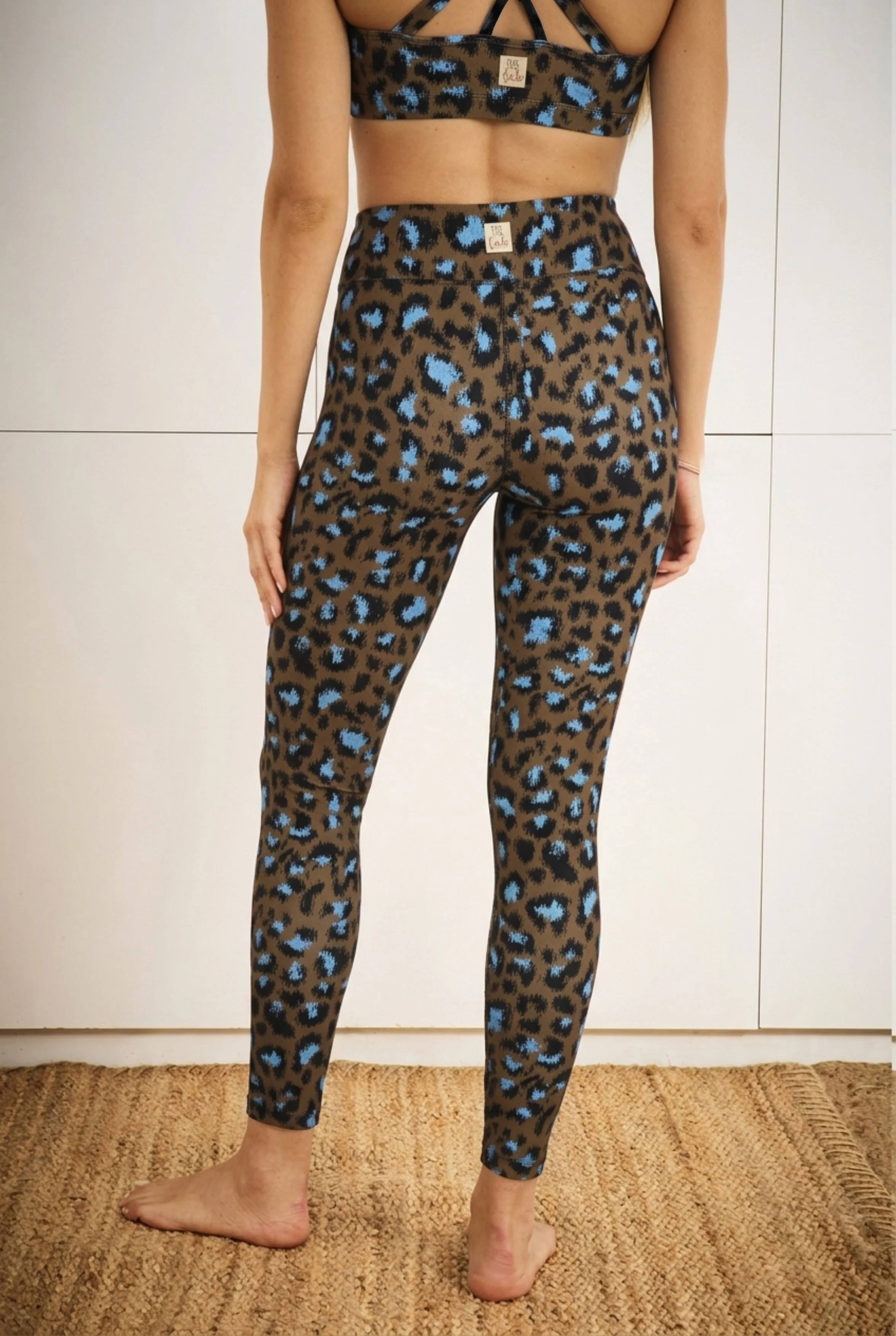 ALAIA leggins + EQUINOX top in summer leopard back.jpg