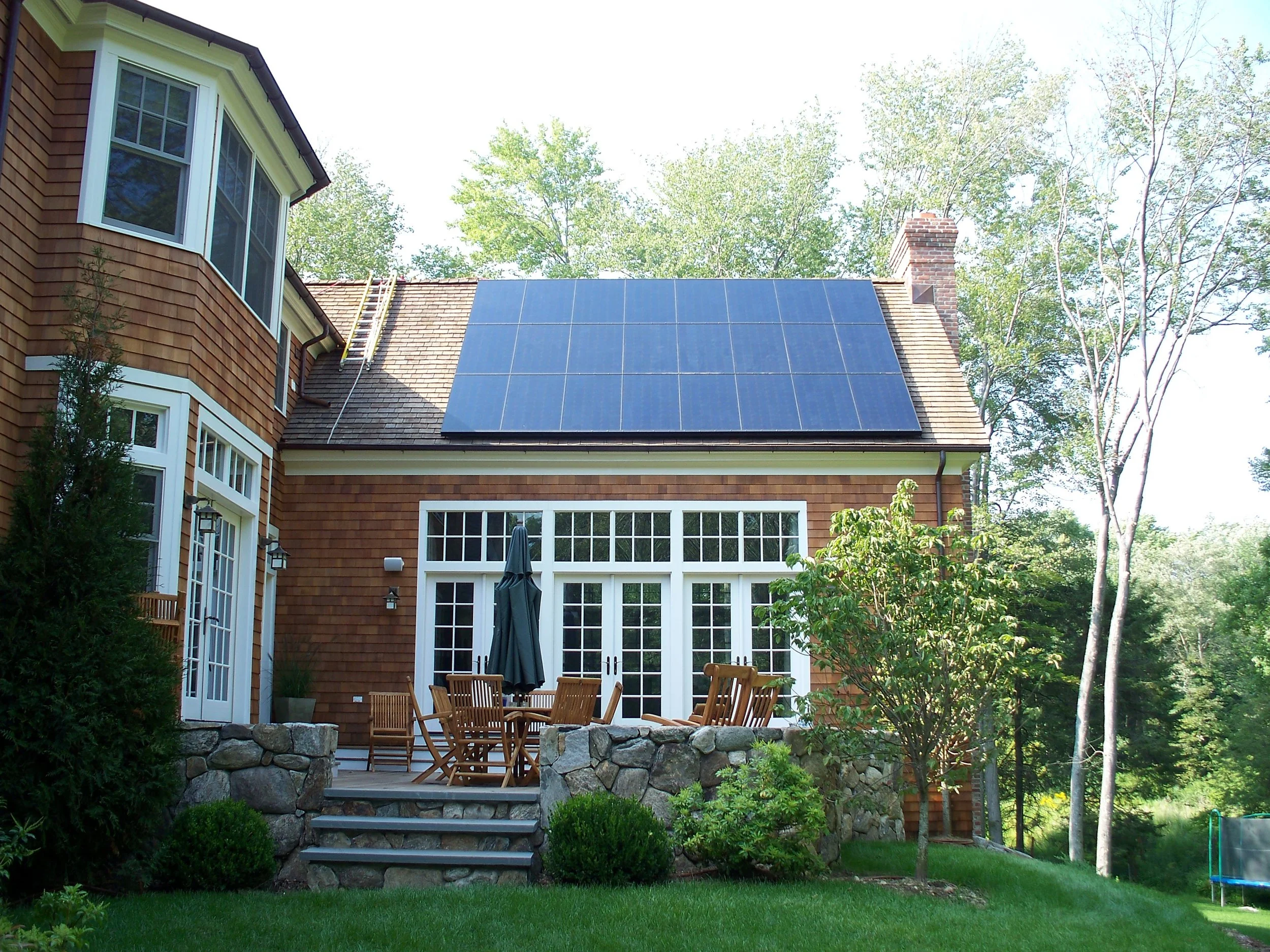 stock-photo-roof-with-solar-panels-fragment-82734334.jpg