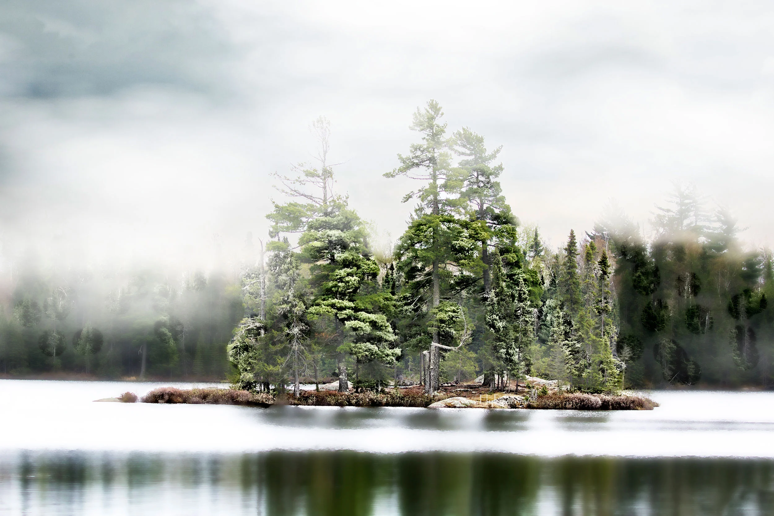 The beautiful photographs of the Boundary Waters throughout this site are by RoyMisonznick