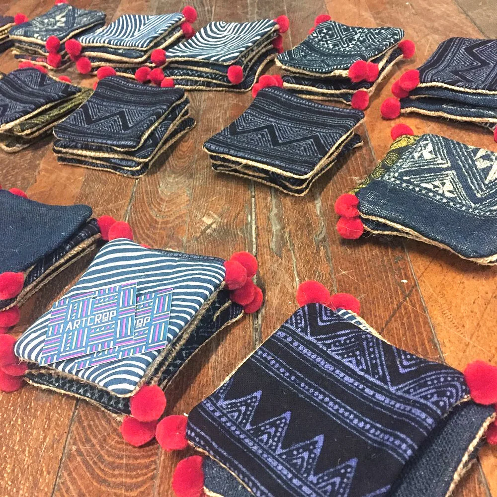 Oskar Ly created 50 sets of unique coasters using indigo-dyed batik textiles sourced from Hmong artisans from Southeast Asia.