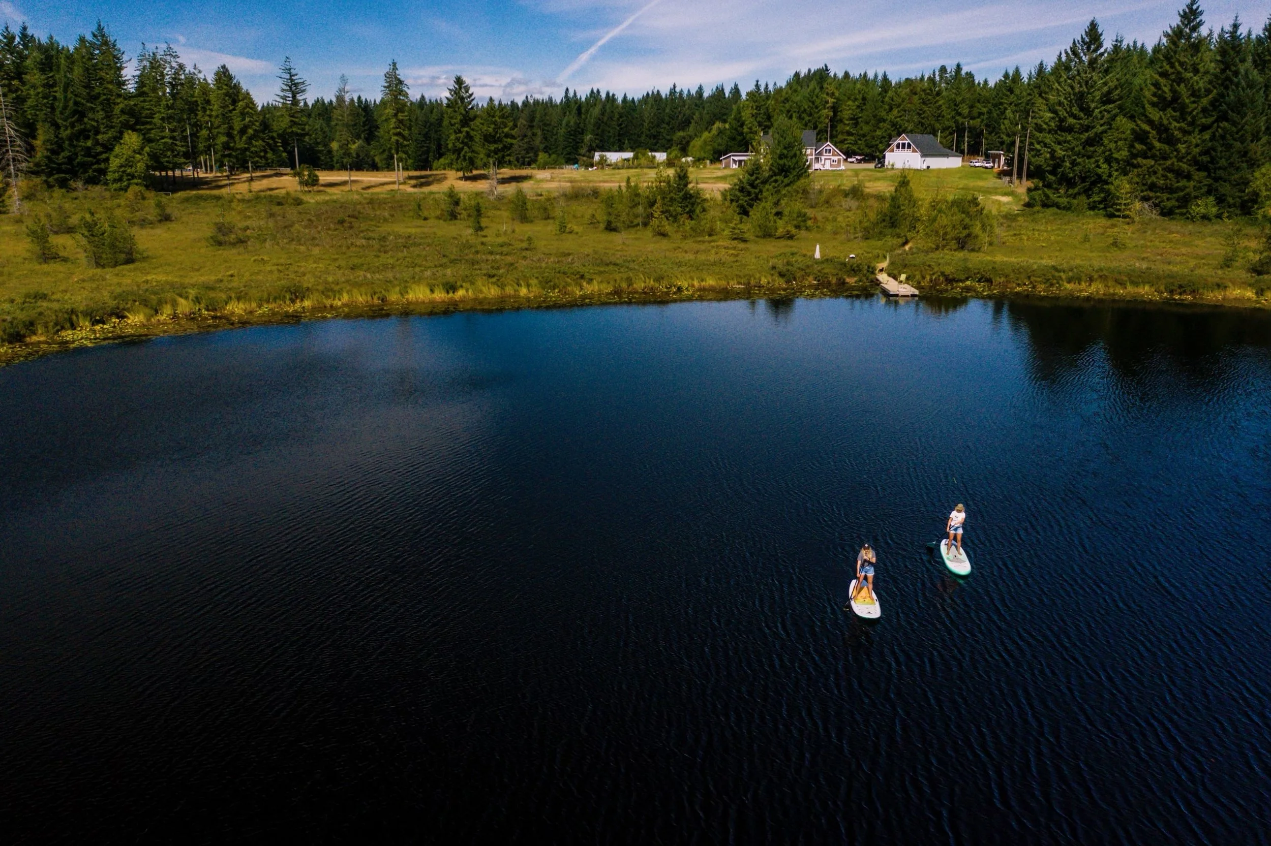 Drone paddleboard lake.jpg