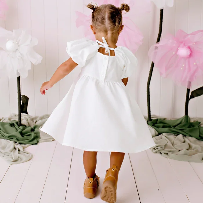 Baby Grace Linen Tie Back Dress Model 2.webp
