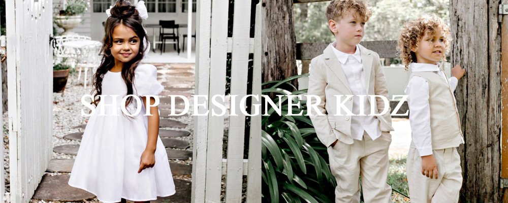 Three children dressed in stylish, elegant clothing in outdoor setting, with the text 'Shop Designer Kidz' overlaid.